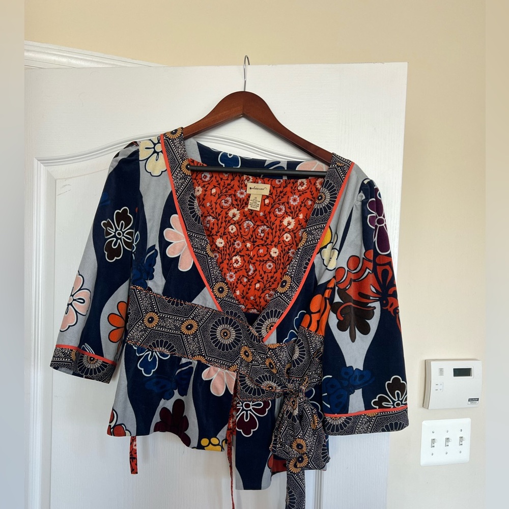 Anthropologie wrap top . Never worn size 10